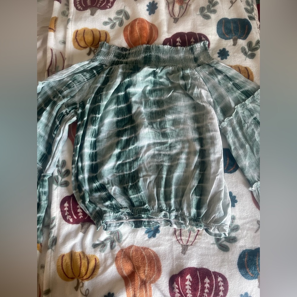Green and white off the shoulder top. Size: small with peplum like sleeves